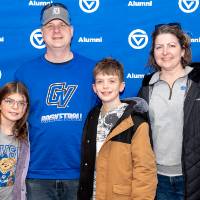 Group of four posing for photo
